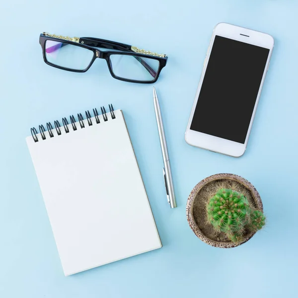 Office equipment on blue background in top view — Stock Photo, Image