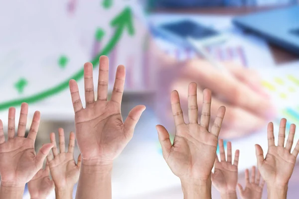 man hands raising with business blur background