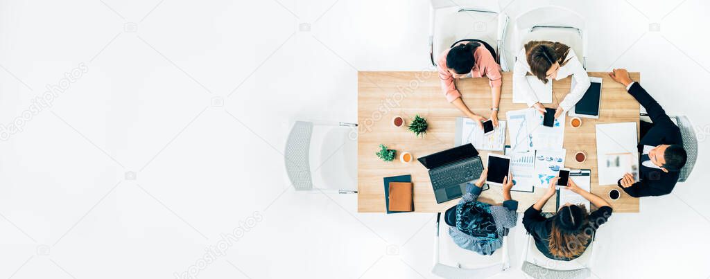 top view of business partners having conversation.the concept of teamwork.Young Business Team Brainstorming Meeting Process.Coworkers Startup Marketing Project.Creative People Making Great Work Decisions Wood Table.