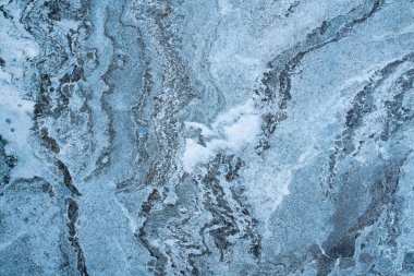 Blurry abstract of marble stone wall texture background.