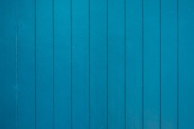Blue wall with planks pattern texture for background with copy space.