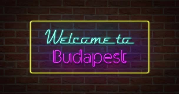 Signo Texto Neón Bienvenido Budapest Fondo Ladrillo — Vídeos de Stock