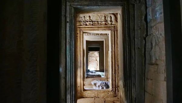 Stone rock door interior decoration in Bayon Temple in Angkor wa