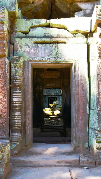 Stone rock ruin door at Ta Prohm Temple in Angkor wat complex, S