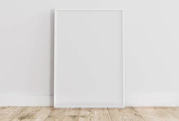 Leeg dun wit frame op lichte houten vloer met witte wand erachter. Lege poster frame model. Lege fotolijst model. Blanco fotolijst. — Stockfoto