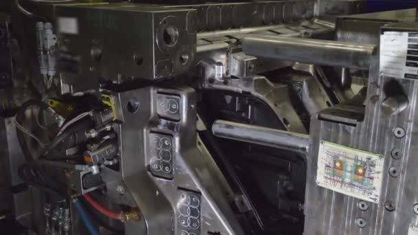 Automatic Plastic Injection Molding Machine Robotics Arm Removes Finished Headlamps — Stock Video