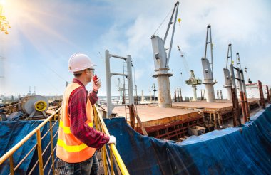 foreman, supervisor, inspector, worker, engineering works on climb against safety system and regulation rule, works at risk & high level of insurance