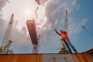 foreman, supervisor, inspector, worker, engineering works on duty for checking safety, security system to ensure the industrial jobs done under regulation rule, works at risk & high level of insurance