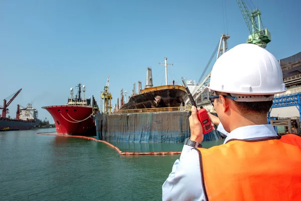 engineering, harbor master or port controller or engineering in connecting to ship, to command the ship to takes berthing in place to the floating dry dock terminal, for operation of recondition, repairing and painting
