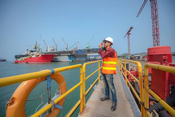 port controller, harbor master in command on the terminal port for safety and control security during the operation of ship in por