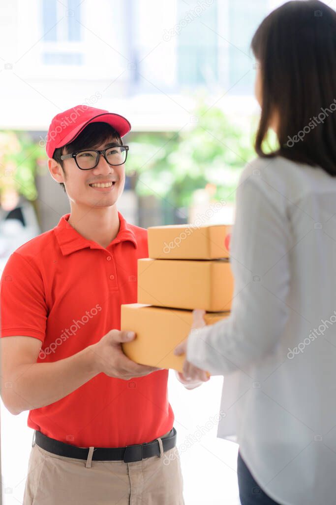 delivery man attending to delivery parcel packages to destination end, handover parcel packages from delivery man to customer
