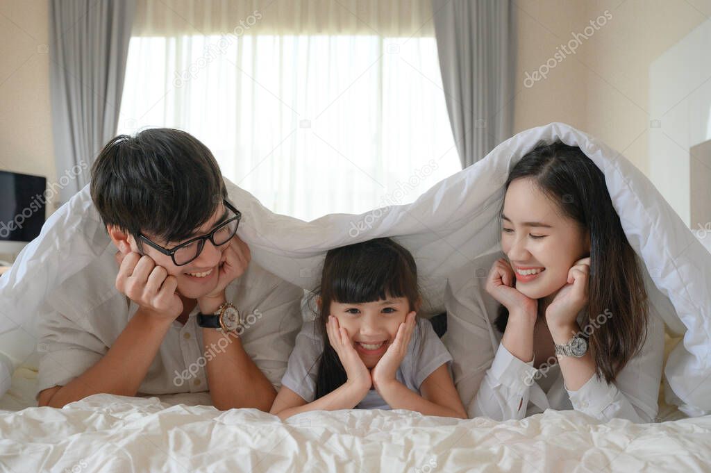 family member playing on bedroom together at holiday weekend, feel free comfortable at weekend holiday