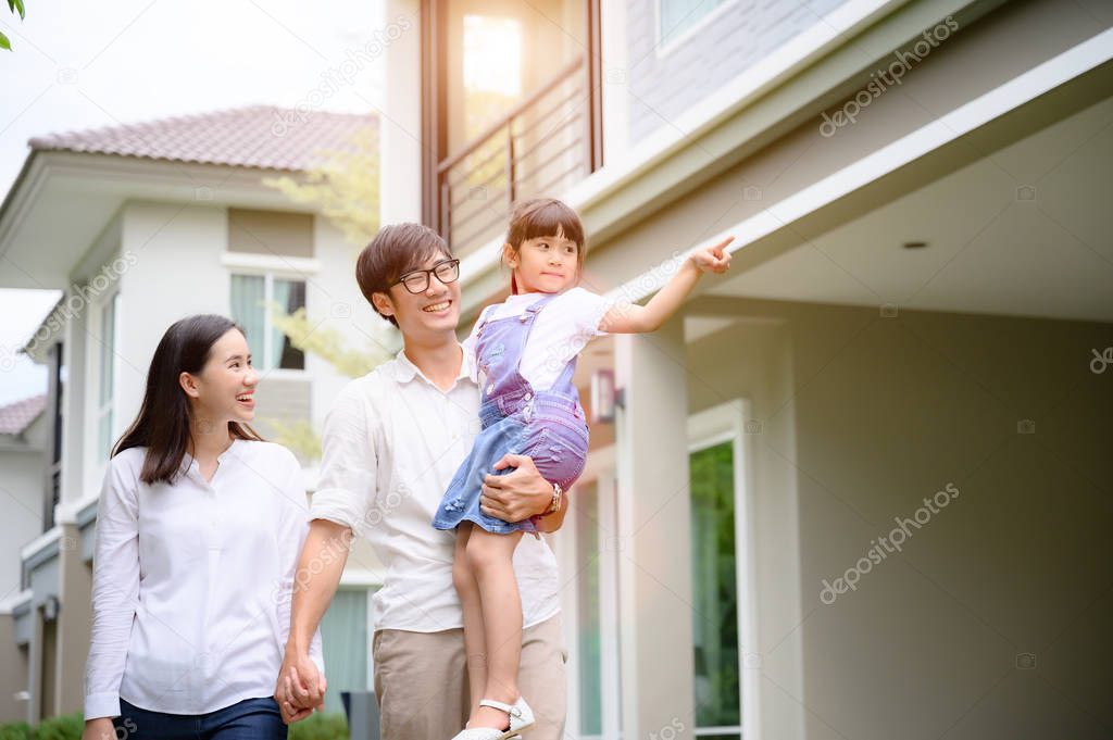 family walking on the model new house looking for living life future, new family meet new house
