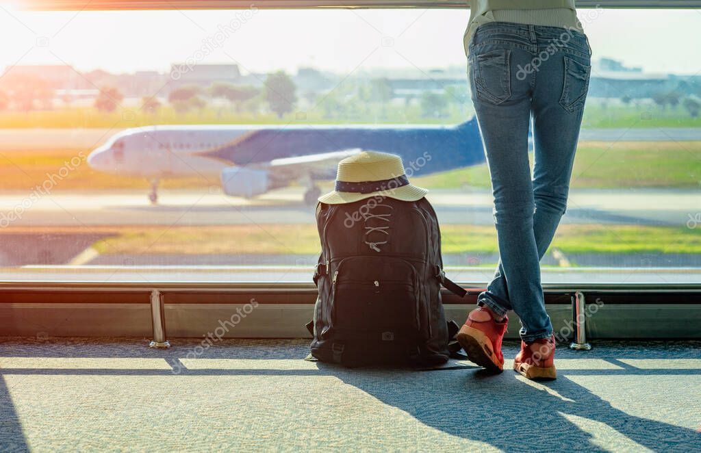 passenger tourist or traveller late, delay checking in the gate terminal at boarding pass entrance, aircraft just leaving from the terminal