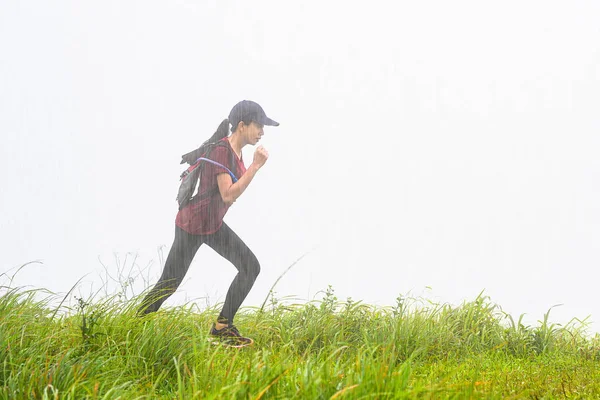 Sporty Woman Running Trail Competition Hill Mountain Morning Raining Shower — Stok fotoğraf