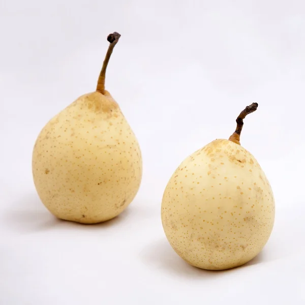 Two yellow red pears isolated on white background as package design element — Stock Photo, Image