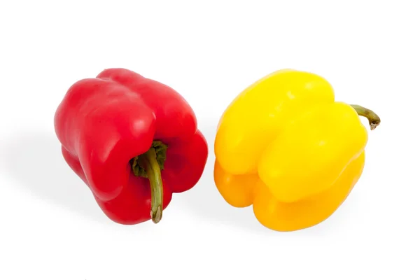 Red and yellow peppers isolated on white background — Stock Photo, Image