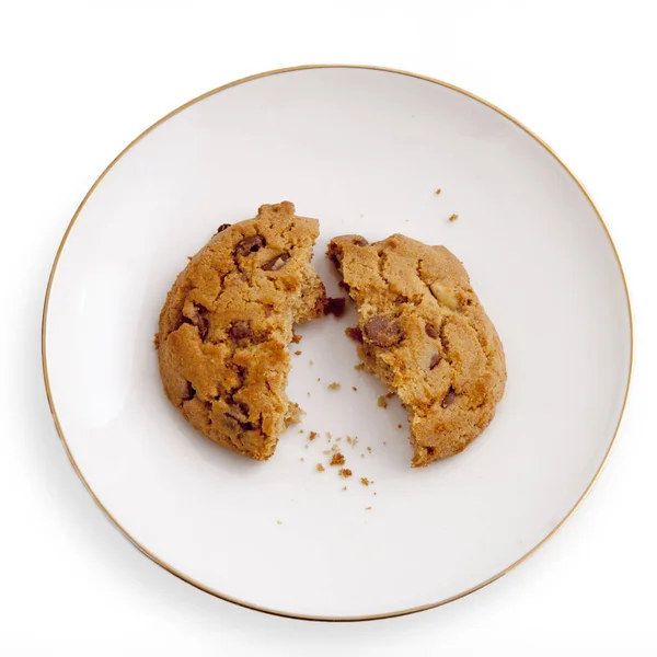 Break oatmeal cookies on a saucer — Stock Photo, Image