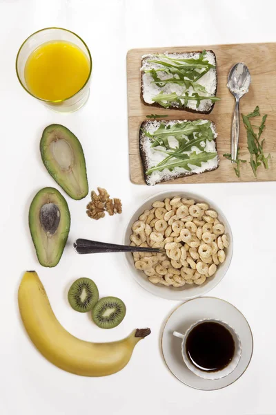 The ideal breakfast for the proper energy for the full day. Coffee with milk, orange juice, fruit . — Stock Photo, Image