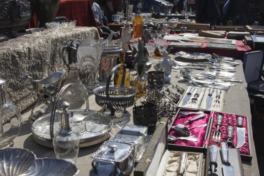 Street flea market of old things and antiques in the old district clipart
