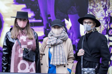LONDON, UK- febryary 15 2020: Fashionable people on the street . Street style. London fashion week