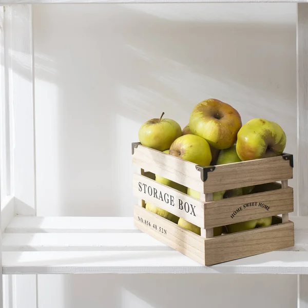 Green Apples Wooden Box Shelf Concept Stock Image