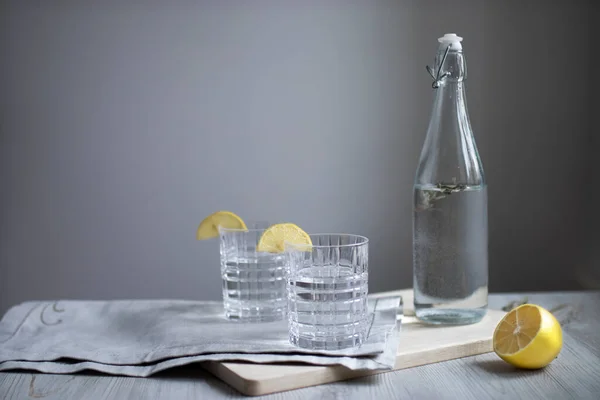 Lemon Lemonade Tarragon Transparent Bottle Table Background Gray Wall Two — Stock Photo, Image