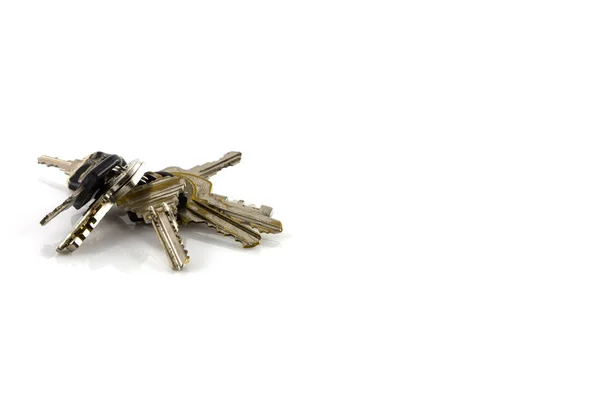 Stort gäng nycklar isolera — Stockfoto