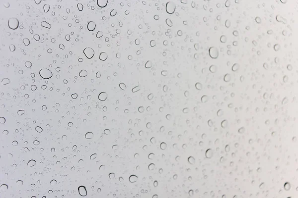 Gotas de agua sobre vidrio — Foto de Stock