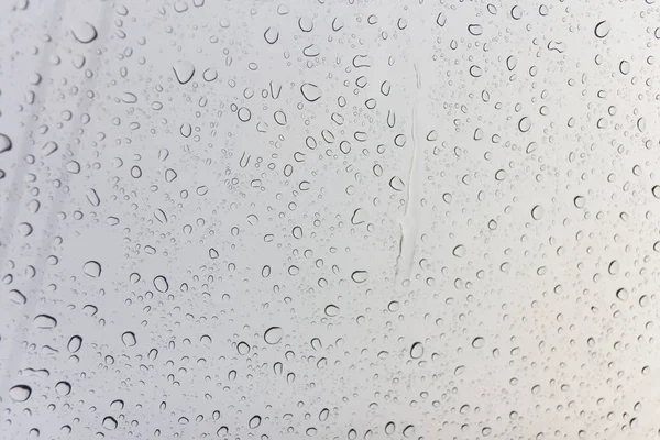 Gotas de agua sobre vidrio — Foto de Stock