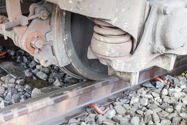 closeup wheel break and suspension system of diesel train