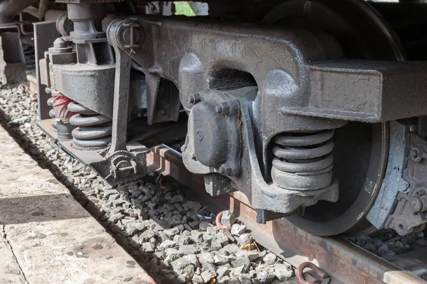 closeup wheel break and suspension system of diesel train