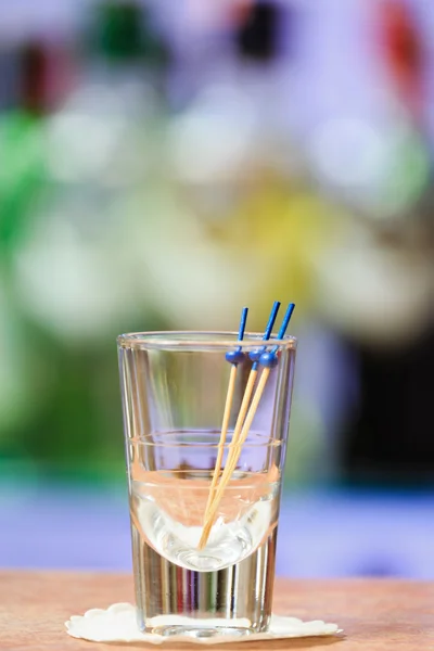 Three sticks in the shot glass — Stock Photo, Image