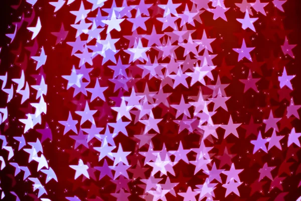 Star shaped blurred bokeh background with sparkles — Stock Photo, Image