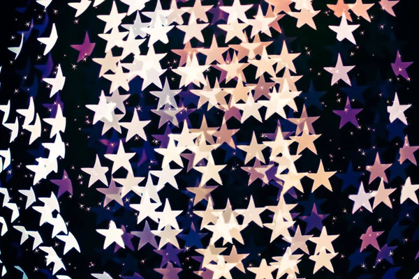 Зоряна форма розмитого фону боке з блискітками — стокове фото
