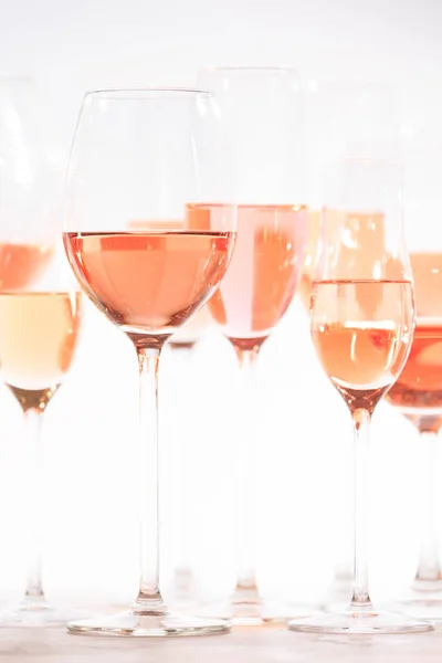 Many glasses of rose wine at wine tasting. Concept of rose wine — Stock Photo, Image