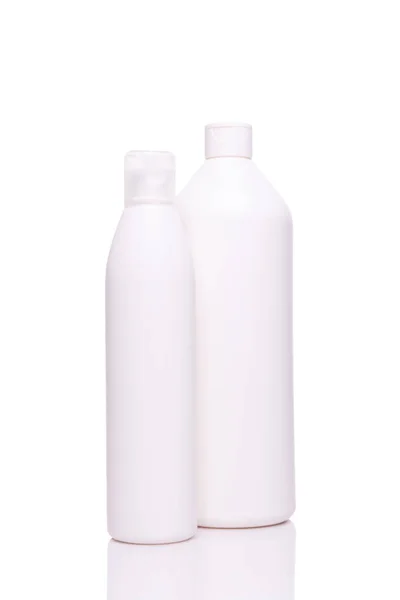 Botellas estándar blancas limpias para salón profesional y uso en el hogar —  Fotos de Stock