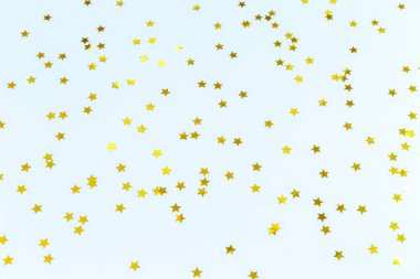 Mavi altın yıldız sprinkles. Şenlikli tatil arka plan. Celeb