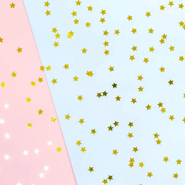 金色的星洒在双粉红色和蓝色。喜庆的节日 b — 图库照片