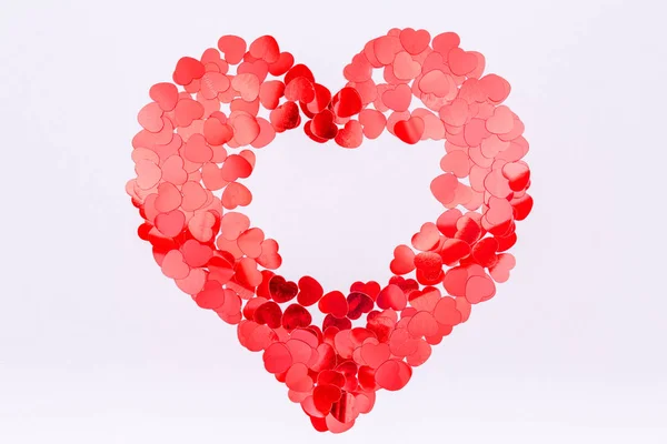 Heart shaped glitter confetti. Valentine day concept. Trendy min — Stock Photo, Image