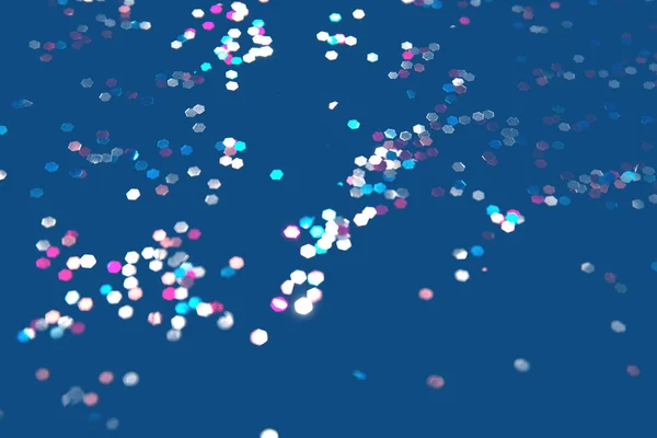 Fundo azul clássico com luzes bokeh multicoloridas brilhantes. Fundo de férias, Natal e Ano Novo — Fotografia de Stock