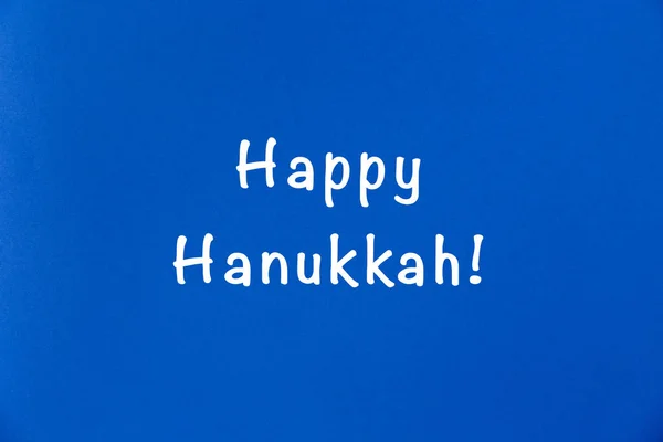 Multiúso, qualquer uso simples fundo azul escuro com Happy Hanukkah formulação. Férias e todos os dias, Hanukkah e conceito de feriado judaico . — Fotografia de Stock
