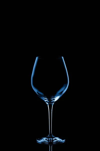 Red wine glass toned in classic blue on the dark background — 스톡 사진