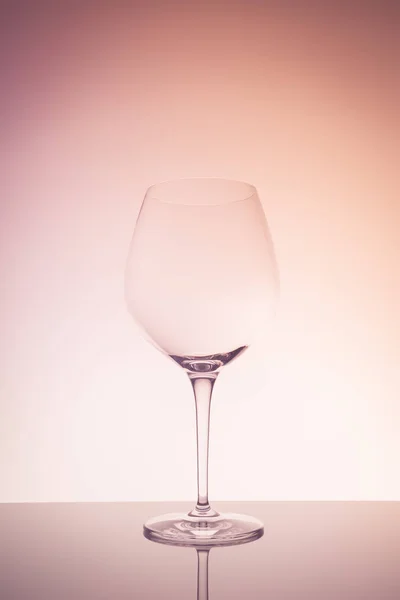 Red wine glass on creative background — 스톡 사진