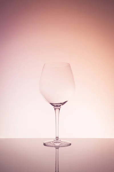 Red wine glass on creative background — 스톡 사진