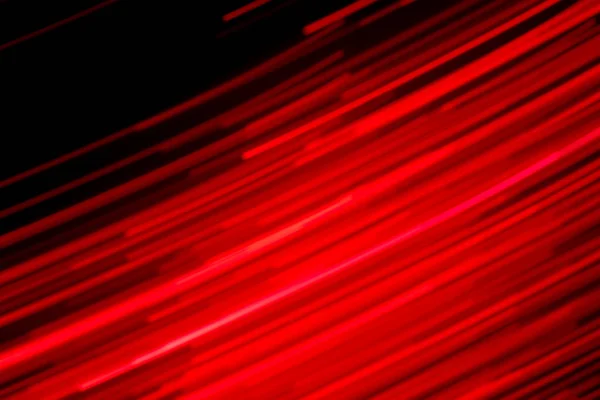 Futuristické rozmazané světla dovolená monochromatické pozadí v nasycené červené a černé, ideální pro Vánoce, Nový rok, Valentýn, párty, pokles technologie — Stock fotografie