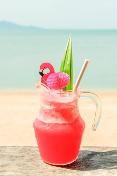 Colorful watermelon mocktail at the beach bar. Vacation, get away, summer outing concept — Stock Photo, Image