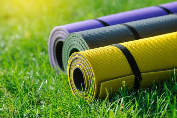 Gymnastic mats on the grass — Stock Photo, Image