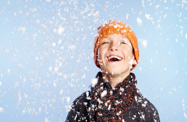 Small Series of two Bothers with orange hats in Winter Snow Background: Hapiness over the cold season: Pure Love for Snow
