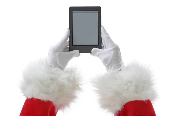 Weihnachts-Konzeptaufnahme mit Weihnachtsmann, der einen E-Book-Reader in die Kamera hält, isoliert auf weiß — Stockfoto